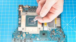 Apply a small amount of new thermal paste (slightly smaller than the size of a pea) on the processors.