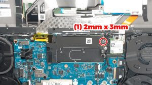 Unscrew and slide out the SSD bracket (1 x M2 x 3mm).