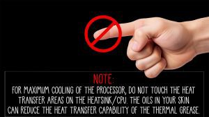 NOTE: For maximum cooling of the processor, do not touch the heat transfer areas on the heatsink/CPU. The oils in your skin can reduce the heat transfer capability of the thermal grease.