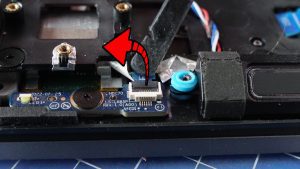 Unclip the locking tab to unlatch and disconnect the LED Board cable.