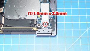 Unscrew and remove the bracket (1 x 1.6mm x 2.3mm).