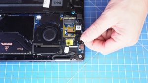 Unscrew and remove the display cable/USB-C bracket (2 x 1.6mm x 3mm).