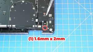 Unscrew and remove the power button bracket (1 x 1.6mm x 2mm).