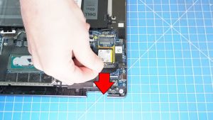 Unscrew and remove the SSD shield (1 x 1.2mm x 1.5mm).