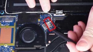 Unscrew and remove the WiFi bracket (1 x captive screw).