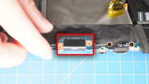 Unscrew and remove the LCD cable bracket (2 x 1.6mm x 1.8mm).