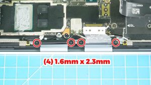 Unscrew the 2 LCD cable brackets (4 x 1.6mm x 2.3mm).