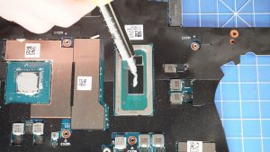 Apply a small amount of new thermal paste to the processors.
